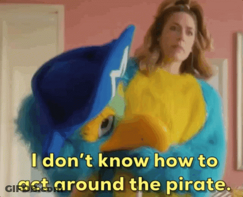 Woman Holding Stuffed Animal Saying I Don't Know How To Act Around The Pirate GIF