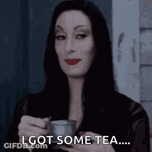 Woman Holding Tea Saying I Got Some Tea GIF