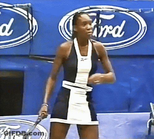 Woman Holding Tennis Racquet In Front Of Ford Ad GIF