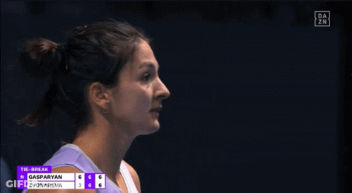 Woman Holding Tennis Racquet GIF