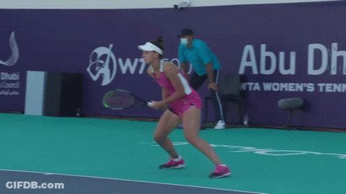 Woman Holding Tennis Racquet GIF