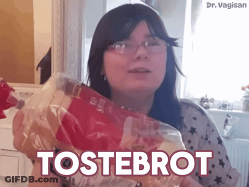 Woman Holding Tostebrot Bread Bag GIF