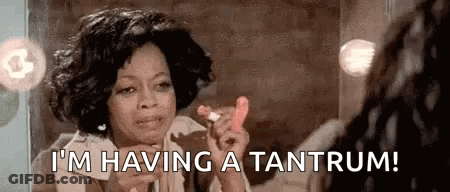 Woman Holding Toy Saying I'm Having A Tantrum GIF