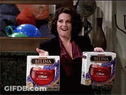Woman Holding Two Boxes Of Belina Wine GIF