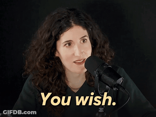 Woman Holding Voodoo Doll Talking On Phone GIF
