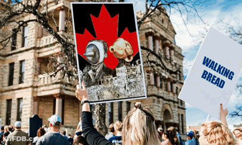 Woman Holding Walking Bread Sign GIF
