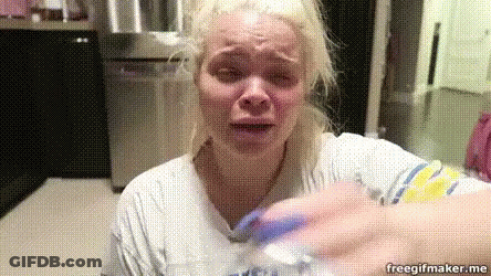 Woman Holding Water Bottle Crying GIF