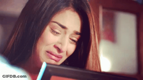 Woman Holding Water Bottle Crying GIF