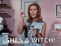 Woman Holding Water Glass Saying I'm A Witch GIF