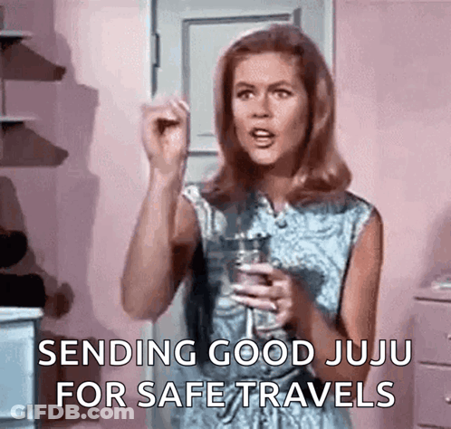 Woman Holding Water Glass Sending Good Juju GIF