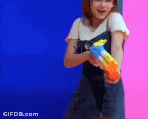 Woman Holding Water Gun GIF