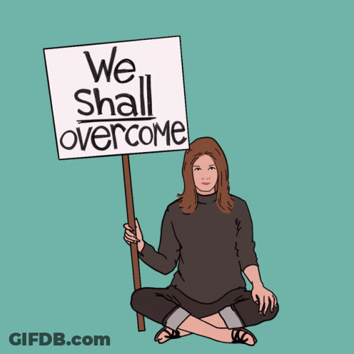 Woman Holding We Shall Overcome Sign GIF