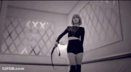 Woman Holding Whip GIF