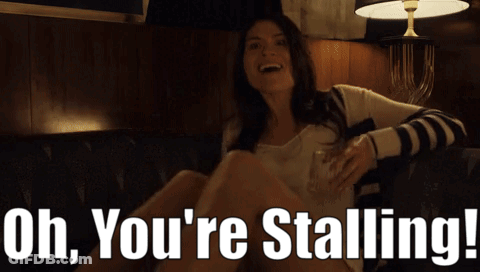 Woman Holding Whiskey Saying Uh You're Stalling GIF