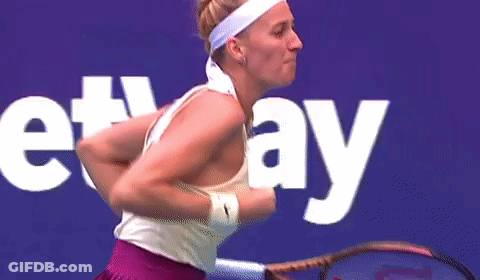 Woman Holding Wilson Tennis Racket GIF