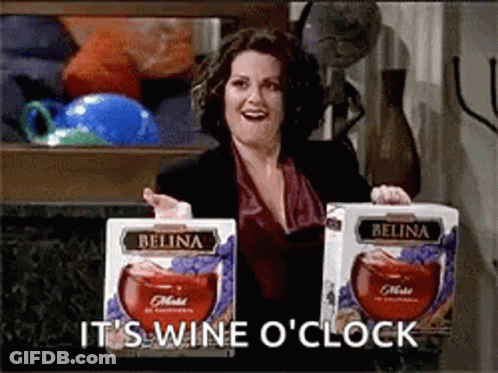 Woman Holding Wine Boxes Saying It's Wine O'Clock GIF