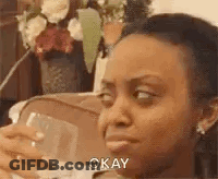 Woman Holding Wine Glass Making Funny Face GIF