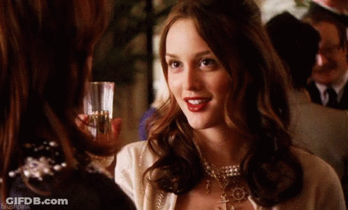 Woman Holding Wine Next To Woman With Blushpink GIF