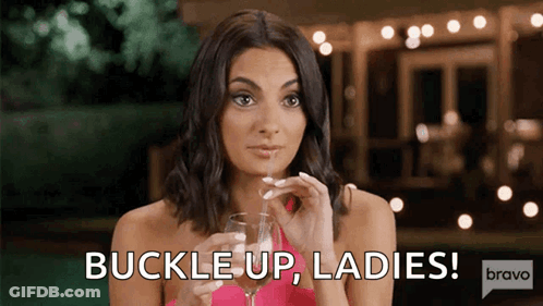 Woman Holding Wine Saying Buckle Up Ladies GIF