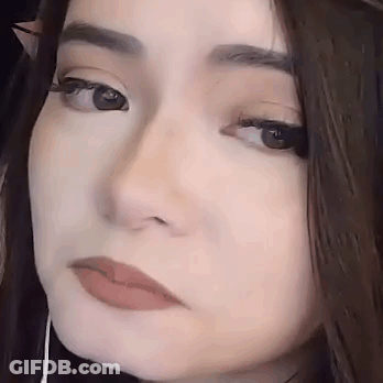 Woman Holding Wonder Woman Cup GIF