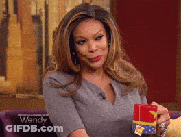 Woman Holding Wonder Woman Cup GIF