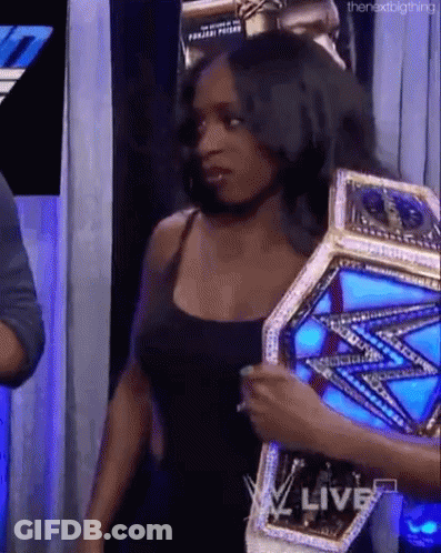 Woman Holding Wrestling Championship Belt GIF