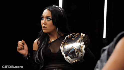 Woman Holding WWE Championship Belt GIF