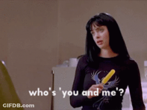 Woman Holding Yellow Popsicle Saying Who's You And Me GIF