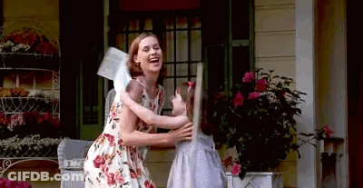Woman Hugging Girl On Porch GIF