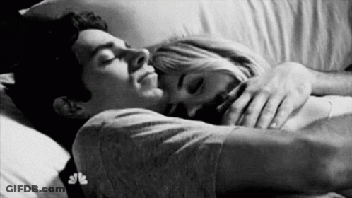 Woman Hugging Man On Couch GIF