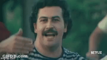 Woman Hugging Mustached Man GIF