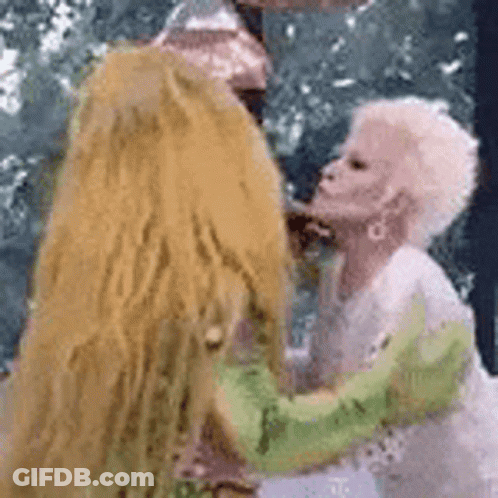 Woman Hugging Stuffed Animal With Long Hair GIF