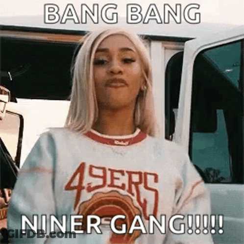 Woman In 49Ers Sweater Near White Van GIF
