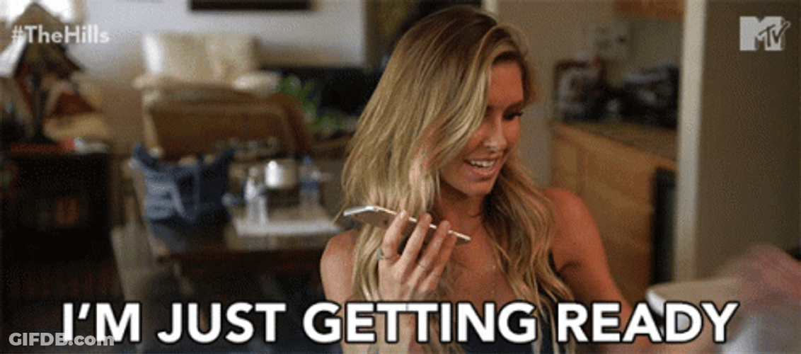 Woman In A Phone Call Just Getting Ready GIF