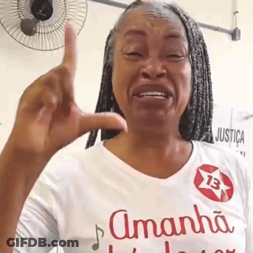 Woman In Amanha Shirt Giving Middle Finger GIF