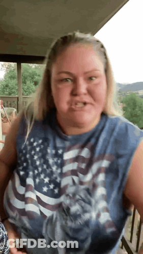 Woman In American Flag Sleeveless Shirt GIF