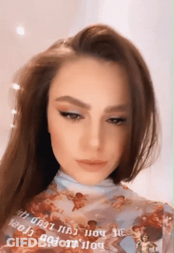 Woman In Angel Shirt With 1301 GIF