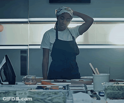 Woman In Apron At Counter With Kepler Sign GIF