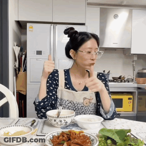 Woman In Apron Giving Thumbs Up GIF