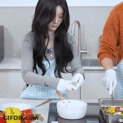 Woman In Apron Preparing Meal GIF
