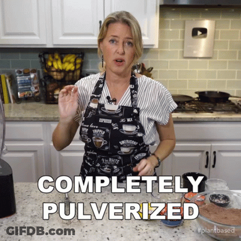 Woman In Apron Saying Completely Pulverized GIF