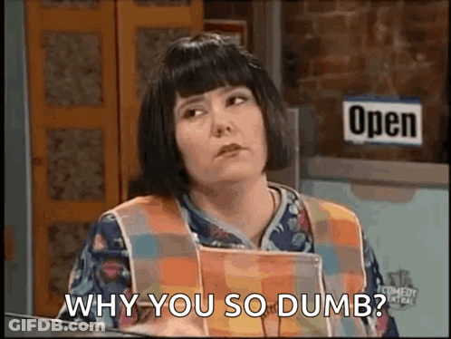 Woman In Apron Standing In Front Of Open Sign GIF