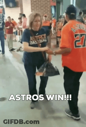 Woman In Astros Shirt Shaking Hands GIF