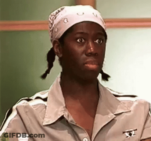 Woman In Bandana And Braids Making Funny Face GIF