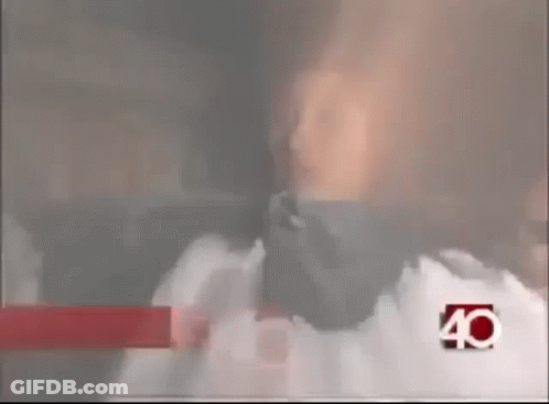 Woman In Bandana Talking Into Microphone With Number 40 Jacket GIF