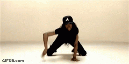 Woman In Baseball Cap Kneeling GIF