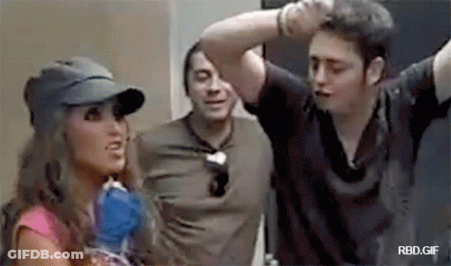Woman In Baseball Cap Talking To Two Men GIF