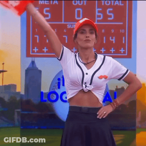 Woman In Baseball Uniform In Front Of Scoreboard 5 To 0 GIF