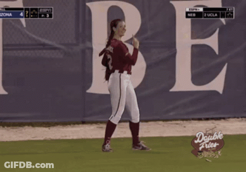 Woman In Baseball Uniform Number 32 GIF