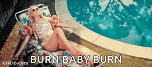 Woman In Bathing Suit Lying By Pool Burn Baby Burn GIF